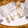 image:imageLayered Gold Initial Necklaces for Women 14K Gold Plated Paperclip Chain Necklace Heart Letter Pendant Toggle Clasp Choker Necklaces for Women Gold Layered Initial Necklaces for Women Jewelry
